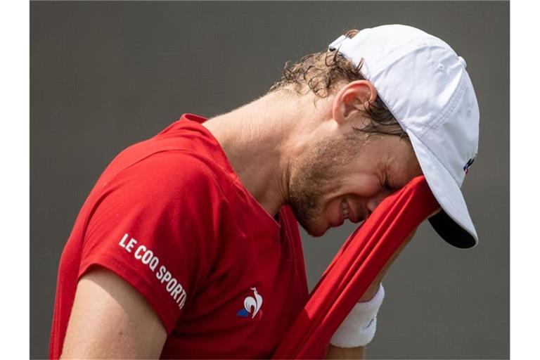 Yannick Hanfmann aus Deutschland reagiert gegen Humbert aus Frankreich. Foto: Marijan Murat/dpa