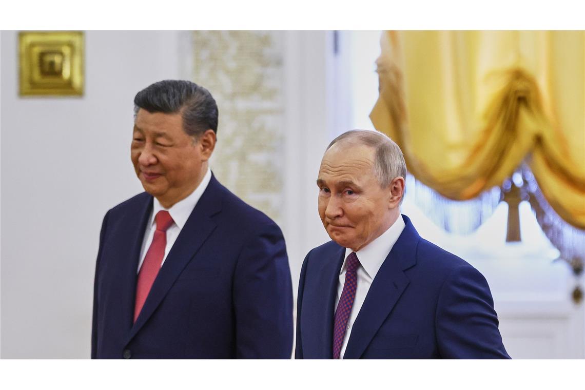 Putin und Xi bekräftigen in Moskau enge Partnerschaft Zufriedene Gesichter bei Xi und Putin.