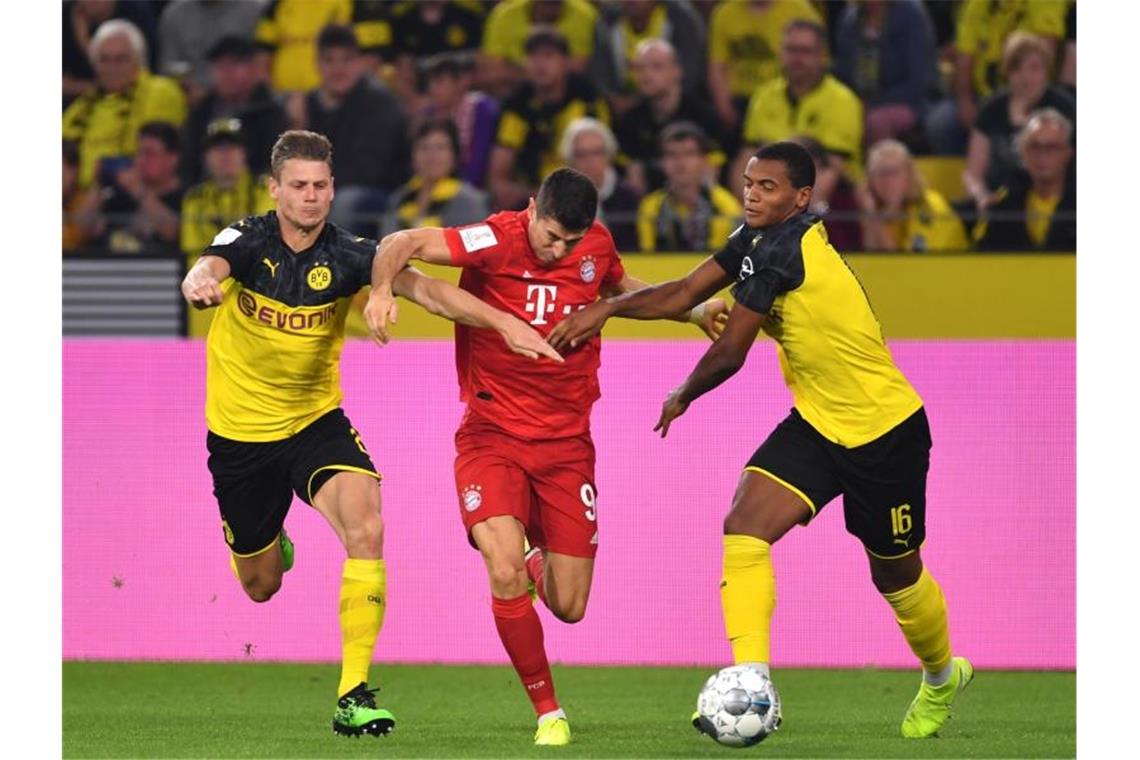 Darüber spricht die Liga: Trainer, Klassiker und Mauerfall Zum Topspiel des elften Spieltages empfängt der FC Bayern München am Samstag Abend Borussia Dortmund. Foto: Marius Becker/dpa