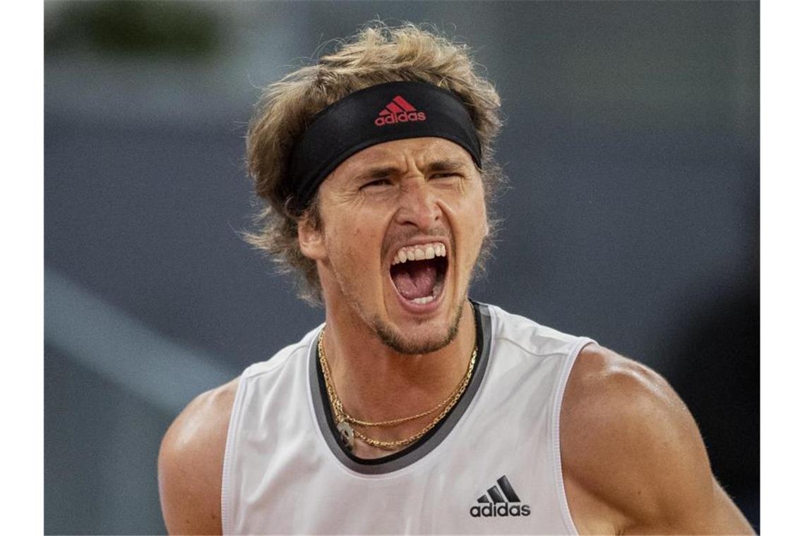 „Unglaubliches Gefühl“: Alexander Zverev siegt in Madrid Zverev setzte sich im Finale nach hartem Kampf mit 6:7 (8:10), 6:4, 6:3 gegen Matteo Berrettini durch. Foto: Bernat Armangue/AP/dpa